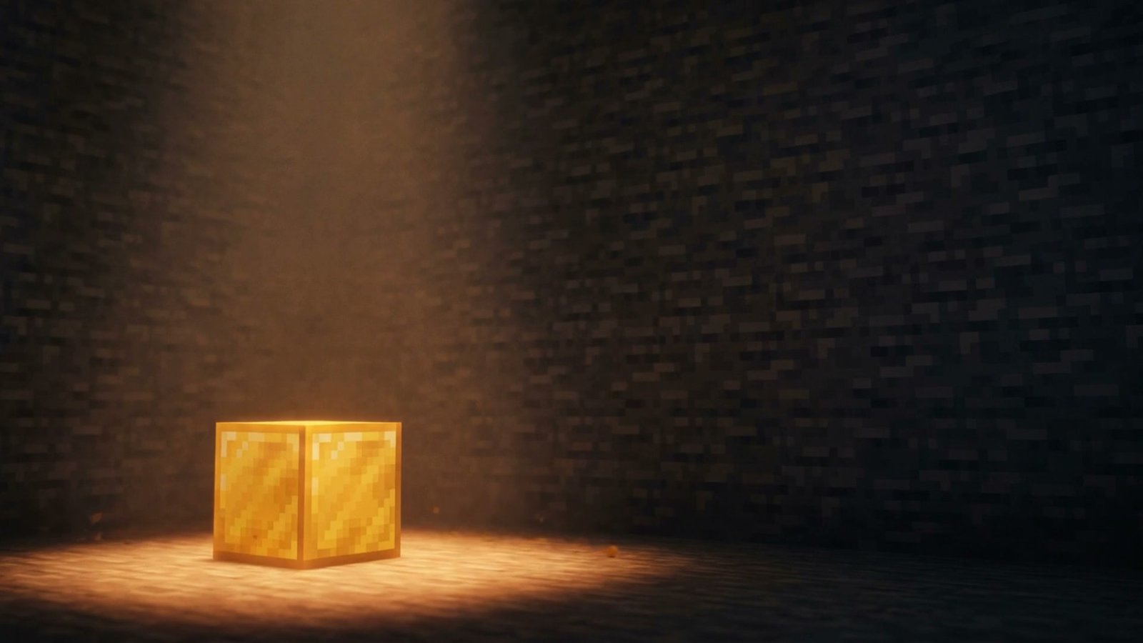 The gold block resting on the vault floor, its glow spilling across the stone